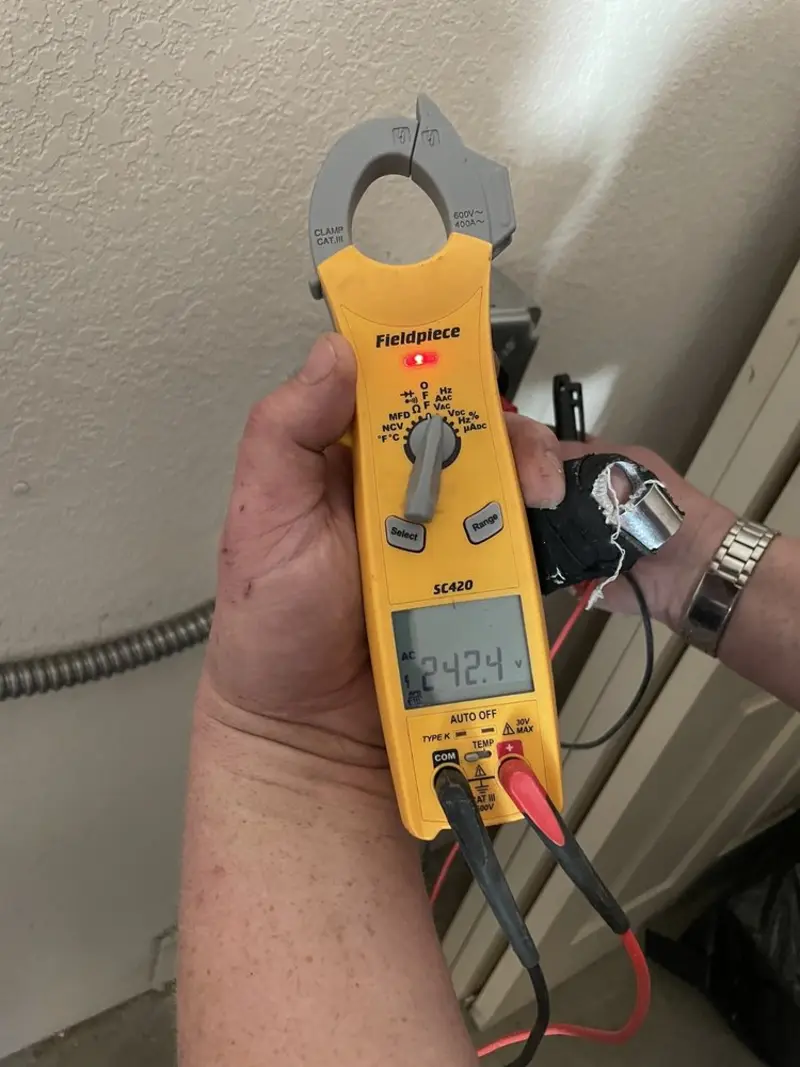 Voltage testing with clamp meter during Ceiling Fan Installation in Tredyffrin